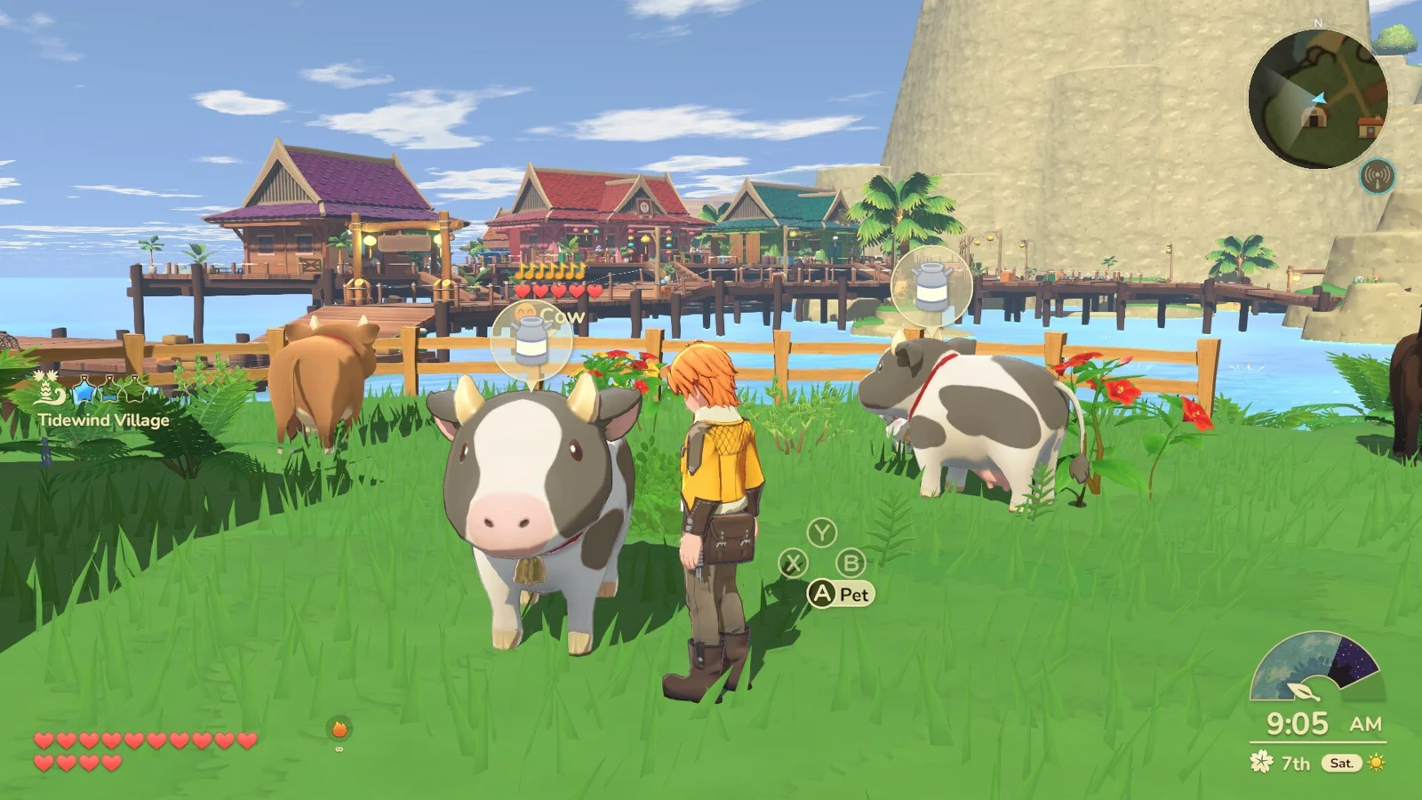 Cows beside a fenced field in an official game screenshot